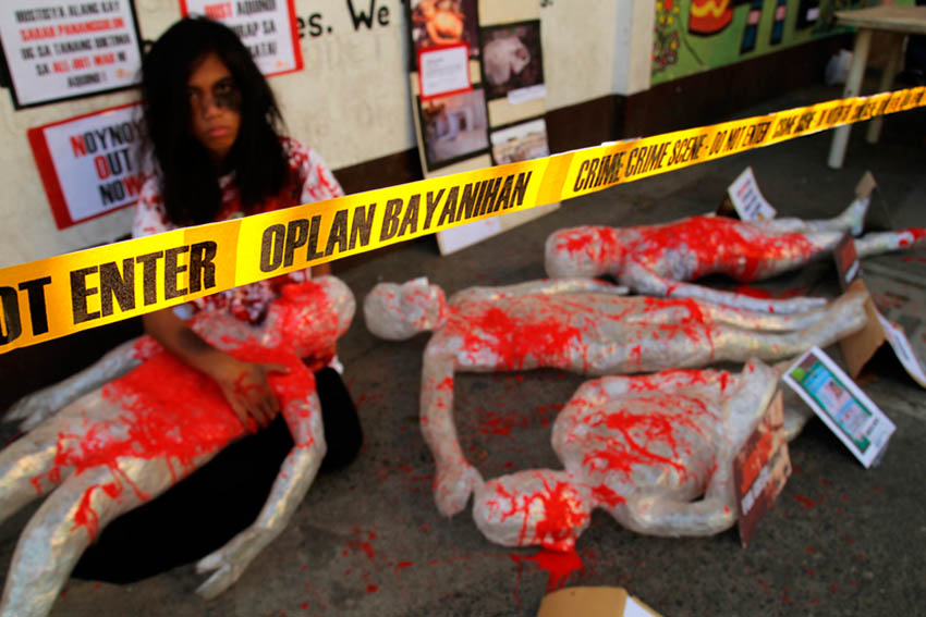 On Holy Wednesday, members of Children's Rehabilitation Center in Southern Mindanao reenacts the situation of children as victims of human rights violations in Mindanao. CRC recorded 21 children killed under Aquino administration, seven of whom are from Davao region. The group also blames the government's counter-insurgency program Oplan Bayanihan as the "culprit" behind children's killings. (Ace R. Morandante/davaotoday.com)