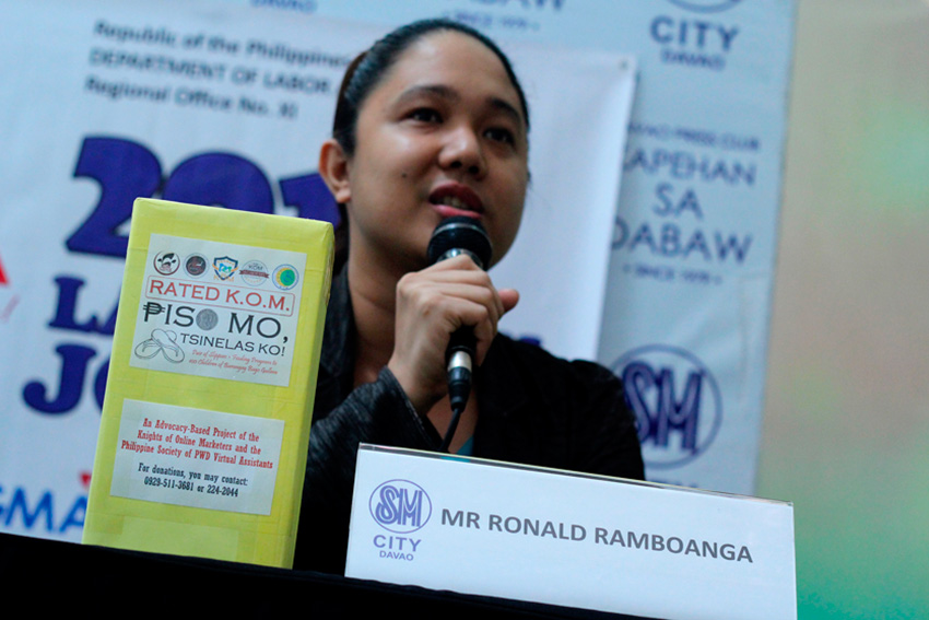 Ronald Ramboanga, CEO of Knights of Online Marketers, a business process outsourcing company, announces that they will donate 100 slippers for kids this coming May 3 in Bago Gallera. (Ace R. Morandante/davaotoday.com)