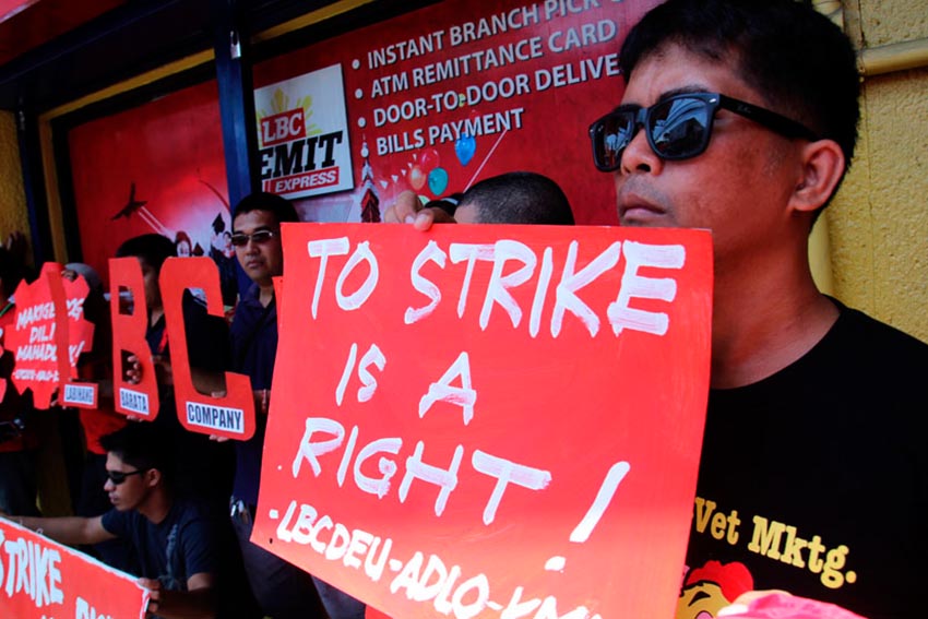 Workers of LBC Davao Employees Union protested outside their main branch in Claveria after filing a Notice of Strike due to the deadlock of their collective bargaining negotiations with the management. (Ace R. Morandante/davaotoday.com)