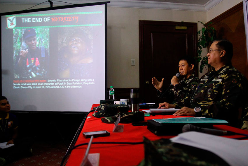 Major General Eduardo Año presents the report on the death of Leoncio "Ka Parago" Pitao of the New People's Army's 1st Pulang Bagani Command after an operation by the Task Force Minion with troops from 10th Infantry Division, 1003rd Brigade, 69th Infantry Battalion, 6SRC of 2nd Scout Ranger Battalion, and Intelligence Service of the AFP (Isafp) during their press conference on Monday morning. (Ace R. Morandante/davaotoday.com)