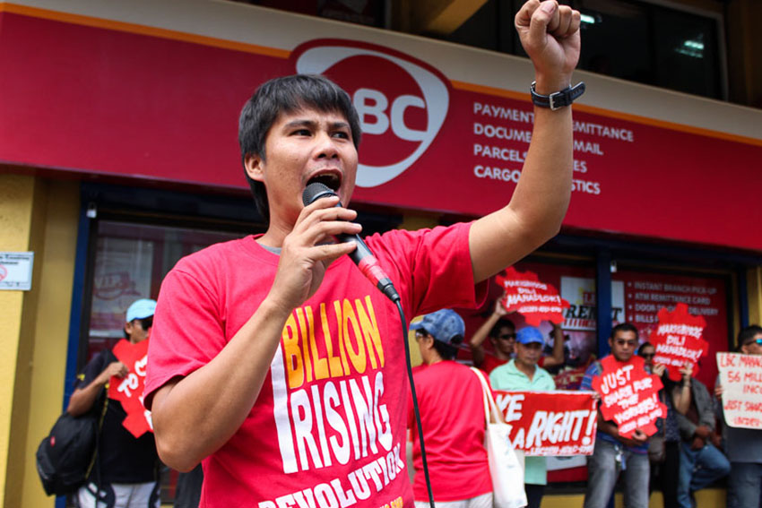 Kilusang Mayo Uno spokesperson Carlo Olalo warns of launching workers' strike for all LBC stores nationwide as they declare June 30 as the National Day of Action and Boycott against LBC.  (Paulo C. Rizal/davaotoday.com)