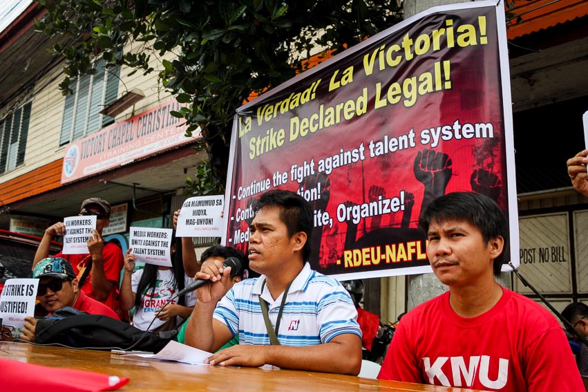 Efren Armilla of RMN Employees Davao union announces their recent victory with the National Labor Relations Commission (NLRC)'s dismissal of the illegal strike case filed against them by the RMN management. (Paulo C. Rizal/davaotoday.com)