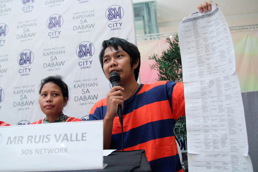 Rius Valle, spokesperson of Save Our Schools Network, shows the long list of documented violations of the army's 68th Infantry Battalion against the schools of Salugpongan in Talaingod, Davao del Norte. He said they already presented their complaint to the Department of Education Region XI, but until now their complaints have not yet been acted upon. (Ace R. Morandante/davaotoday.com)