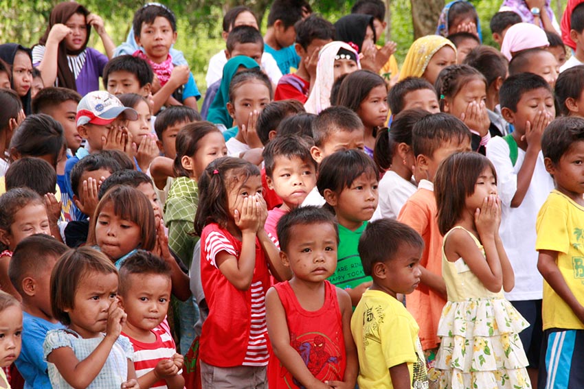 The school children of Sibuto Elementary School in the town of Datu Odin Sinsuat, Maguindanao one of the identified areas where Camp Bader of the Moro Islamic Liberation Front (MILF) is situated, assembled for the start of the Brigada Eskwela last June 5, 2015, that was jointly participated by the Office of the Presidential Adviser on the Peace Process (OPAPP); the Sajahatra Bangsamoro; Armed Forces of the Philippines (AFP); MILF; the Department of Education (DepEd) in Maguindanao; and the Department of Health (DOH) in the Autonomous Region in Muslim Mindanao (ARMM). (Alexander D. Lopez)