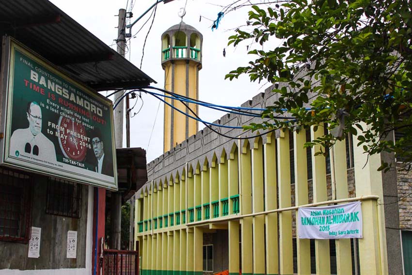 A poster containing messages promoting the passing of the Bangsamoro Basic Law (BBL) as a way to achieve peace in Mindanao is seen inside the Davao City Islamic center, Quimpo Boulevard.   