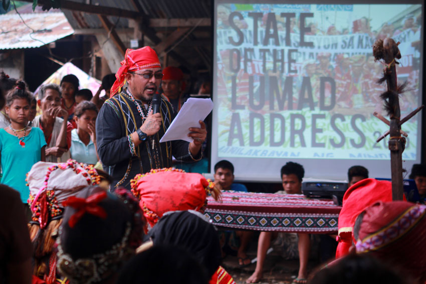 A day before President Benigno Aquino III's last State of the Nation Address, Kerlan Fanagel, a B'laan and spokesperson of Pasaka Confederation of Lumad Organizations, reads their  statement before hundreds of indigenous people evacuees during the State of the Lumads Address at United Church of Christ in the Philippines Haran Mission Center in Davao City. (Ace R. Morandante/davaotoday.com)