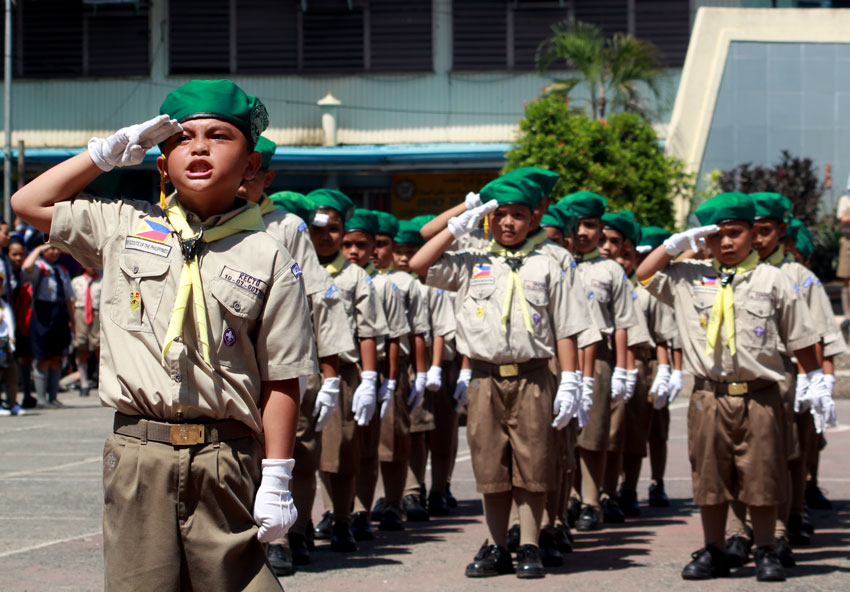 Members of the Boy Scouts of the Philippines in Tugbok District salute their elder scout leaders in Rizal park during the 50th founding anniversary of the Boy Scouts of the Philippines Davao City Council on Friday. (Ace R. Morandante/davaotoday.com)