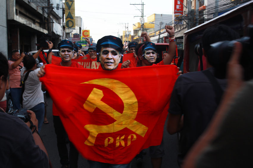 MORE PARAGO. Members of underground revolutionary organizations staged a lighting rally on Tuesday afternoon along Claveria Street in Davao City. The demonstrators wore masks of the slain rebel leader Leoncio Pitao alias Ka Parago. (Ace R. Morandante/davaotoday.com)