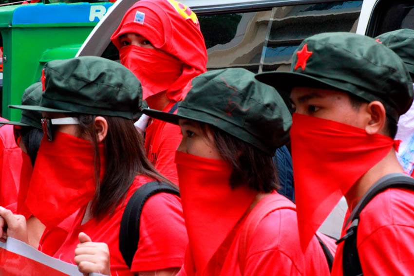 YOUTH. Members of the underground revolutionary youth organization Kabataang Makabayan join the funeral march of New People's Army commander Leoncio Pitao, alias Ka Parago on Thursday. The group also calls for the resumption of peace talks between the government and the National Democratic Front.(Ace R. Morandante/davaotoday.com)