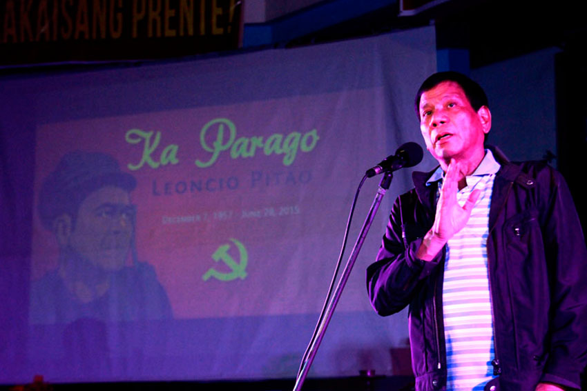 Davao City Mayor Rodrigo Duterte gives his farewell to New People's Army commander Leoncio Pitao, alias Kumander Parago, whom he considers a friend, during the tribute held at the Davao City Recreation Center on Thursday.(Ace R. Morandante/davaotoday.com)