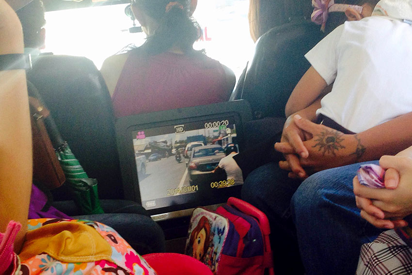 The monitor inside this public utility jeepney (PUJ) plying the route of Mintal to Roxas Avenue Davao City is displaying not a movie, but the actual footage of the traffic situation on the street through a closed circuit television (CCTV) camera installed inside. (Zea Io Ming C. Capistrano/davaotoday.com)