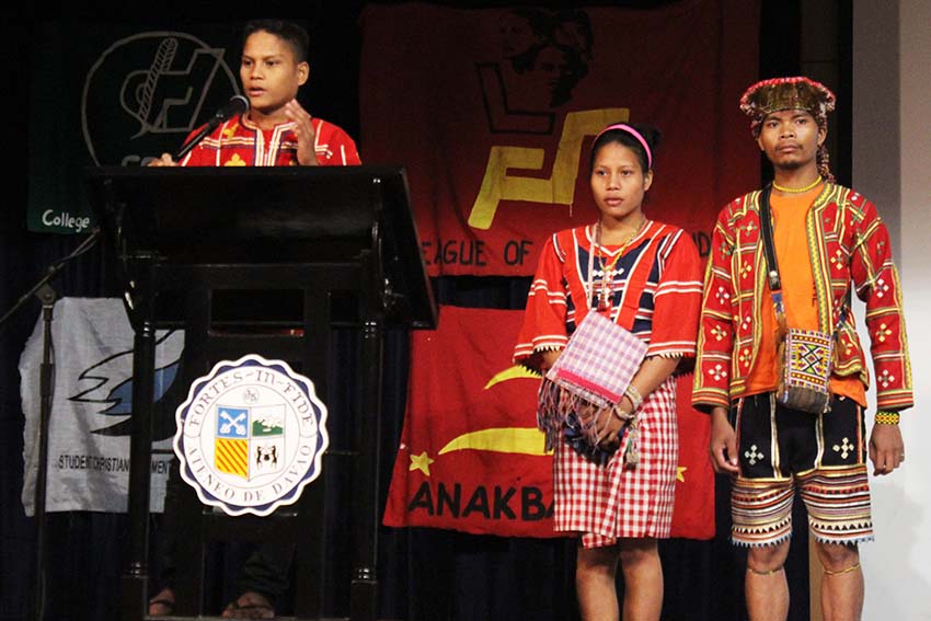 Ata Manobo cousins (left to right) Alvin and Jinky Malibato, who stopped schooling after their community school was not granted a permit to operate due to allegations that it is supported by the New People's Army, join the State of the Youth Address initiated by various youth groups in Davao City on Saturday. (medel hernani) 