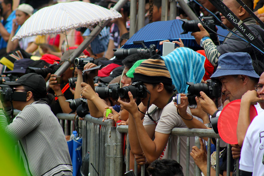 Photographers from different organizations in and outside Davao City try to capture the best shots during the Indak-Indak sa Kadalanan (street dancing) showdown in San Pedro square on Saturday morning. (Ace R. Morandante/davaotoday.com)