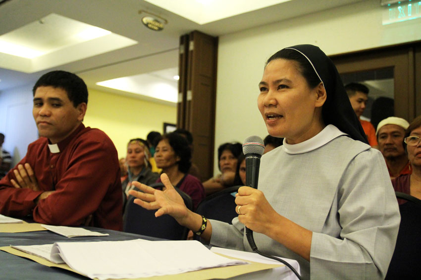 Sr. Stella Matutina, a Filipina Benedictine nun from Mindanao who was the recipient of 2015 Human Rights Award by the Weimar City, Germany, appears before a public hearing conducted by the House committee on human rights in Davao City on Tuesday. She said that cases filed against church people are part of the government's continuing harrasment against human rights defenders. Beside her is Reverend Jurie Jaime of the United Church of Christ in the Philippines. (Ace R. Morandante/davaotoday.com)