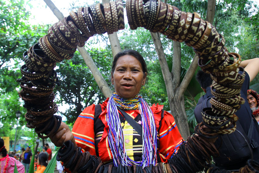 A woman from the Matigsalog tribe in Bayanihan, Marilog District sells her handmade tikus for P10 each to visiting tourists in downtown Davao City who are here for the Kadayawan festival. (Ace R. Morandante/davaotoday.com)