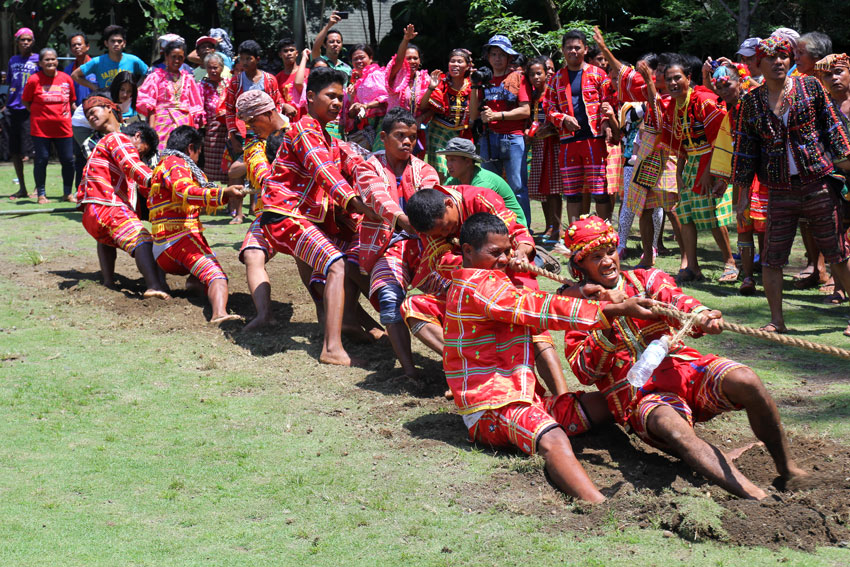 STRENGTH VS STRENGTH. Members of the Ata-Manobo tribe show their strength  in a tug of war game during the Lumadnong Dula held at the People's Park in Davao City on Thursday.