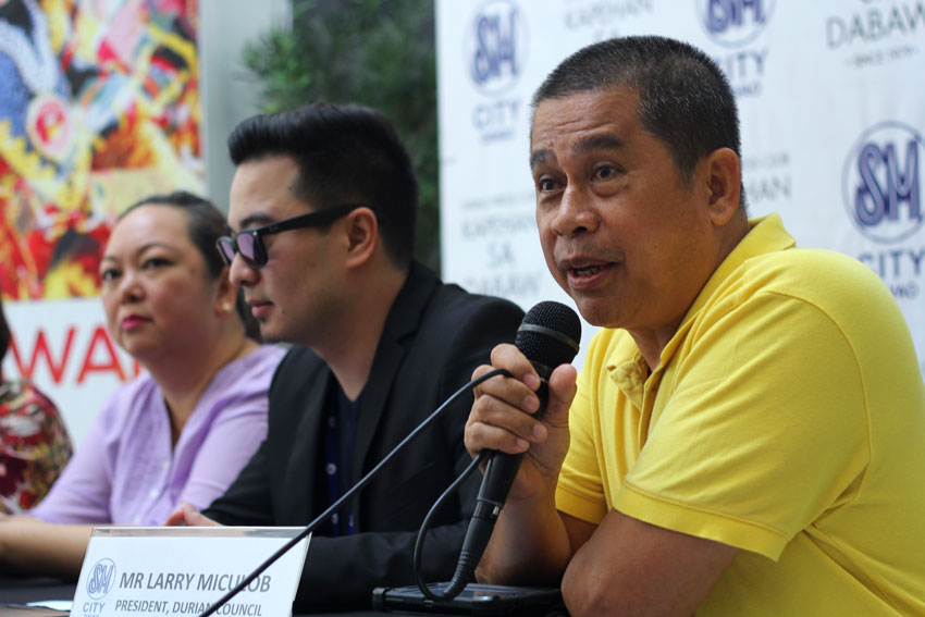 Larry Miculob, Durian Council president, promotes the Durian Festival to the public this August 14 at a shopping mall in Lanang. Miculob said hundreds of Durian growers in Davao will participate in the activity. (Ace R. Morandante/davaotoday.com)