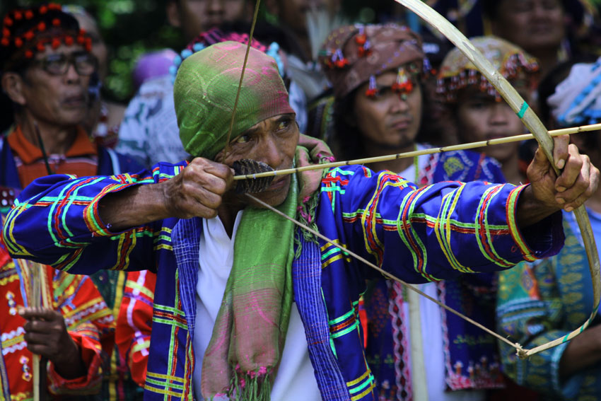 SHARP EYE. A Klata-Manobo focuses on his target using his home-made bow and arrow. 