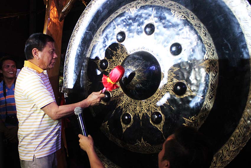 Davao City Mayor Rodrigo Duterte opens the Kadayawan festival at San Pedro Square, Davao City on Thursday afternoon. The formal opening of the festival was cut short by heavy rains in the city last Monday. (Medel V. Hernani/davaotoday.com)