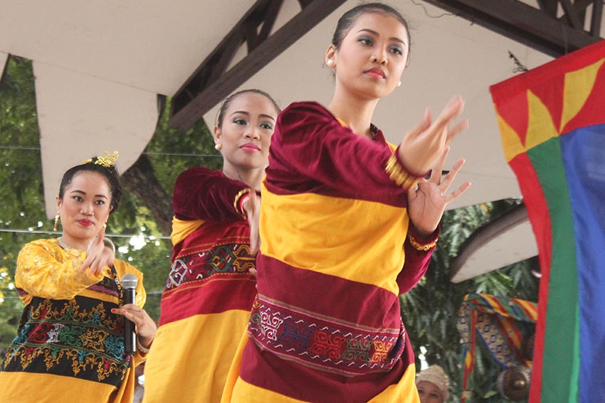 Young Maranao ladies gracefully dance to the tune of Mindanaoan musical instruments during the Lumadnong Bantawan showcasing cultural performances from different tribes in Rizal Park, Davao City Friday afternoon. (Medel V. Hernani/davaotoday.com)