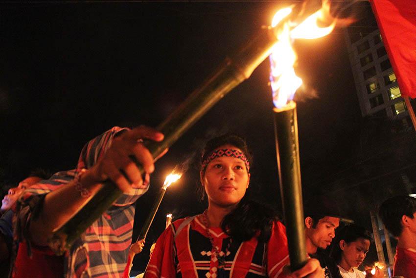 Jinky, 15 years old, is a Manobo evacuee from Kapalong, Davao del Norte. She joined other young people in a torch march on Saturday night to call for peace in Mindanao. (Medel V. Hernani/davaotoday.com)