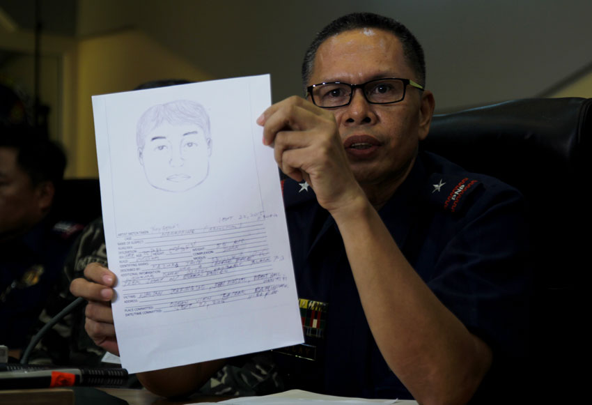 CARTOGRAPHIC SKETCH. Police Chief Superintendent Federico L Dulay Jr, PRO11 Deputy Regional Director for Operations who heads the Special Investigation Task Group to probe the kidnapping incident Monday night, shows to the media the cartographic sketch of one of the suspects who kidnapped three foreigners and a Filipina, as described by the  Japanese couple who managed to escape the kidnapping in Holiday Oceanview Resort in Barangay Camudmud, Babak District, Island Garden City of Samal. (Ace R. Morandante/davaotoday.com)