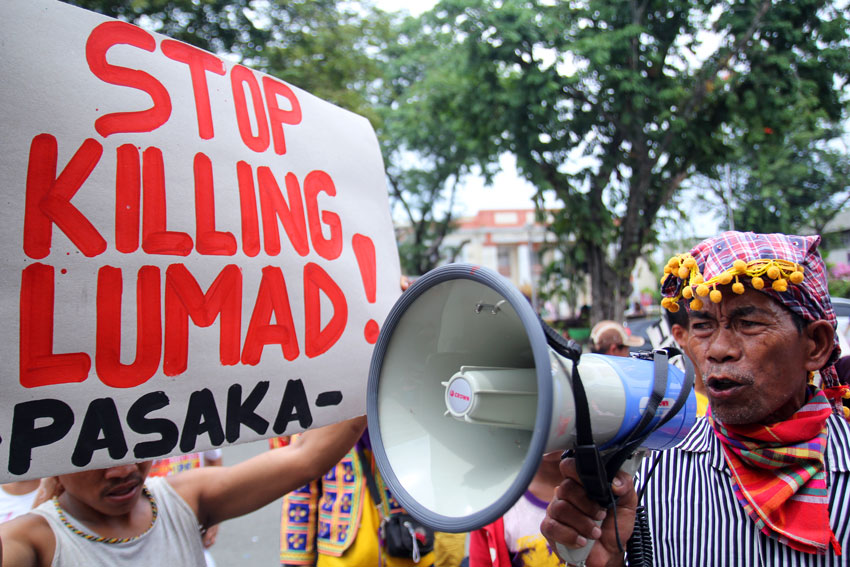 Claro Gawilan, chairman of the Nagkahiusang Mag-uuma sa White Culaman (United Farmers of White Culaman) from Kitaotao town in Bukidnon speaks during their protest rally in San Pedro Street, Davao City on Thursday. The protesters accused the Army as responsible for the continuing harassment and killings of Lumads in Mindanao. (Ace R. Morandante/davaotoday.com)