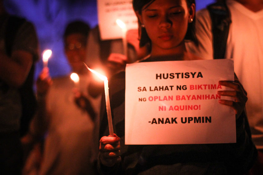 LIGHTS FOR LUMADS.  Students from the University of the Philippines Mindanao campus light candles on Friday to condemn the continuing harassment and killing of Lumads in Mindanao. (Paulo C. Rizal/davaotoday.com)