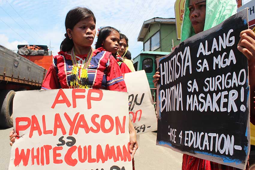 LUMAD EVACUEES in the United Church of Christ in the Philippines Haran compound join the march rally at Camp Panacan on Monday to denounce "militarization" of their communities.  (Medel V. Hernani/davaotoday.com)