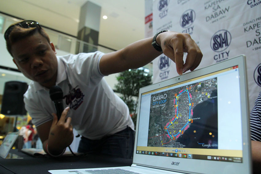 Edward Geguera, Project Maglev (magnetic levitation) operation manager shows the map for the proposed Filipino invention of the Hybrid  Maglev Monorail Train using permanent magnet and aluminum which is said to help solve the traffic problem all over the Philippines. (Ace R. Morandante/davaotoday.com)