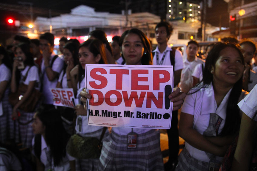 Students of Holy Cross of Davao College express support for their teachers during a protest action held outside the school campus Monday afternoon. (Ace R. Morandante/davaotoday.com)