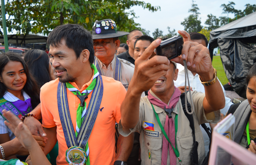 PACMAN. Sarangani Representative Manny “Pacman” Pacquiao is mobbed by delegates when he surprisingly arrived at the 16th BSP Grand Opening Ceremony in Tagum City. Pacquiao is enjoined by Vice President Jejomar Binay and former Philippine National Police (PNP) Special Action Force (SAF) chief General Getulio Napeñas Jr.