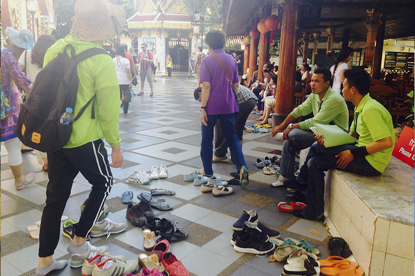 SHOES OFF. Worshippers and visitors of the Wat Phrathat Doi Suthep are asked to take off their shoes before entering the platform of the Golden Chedi.