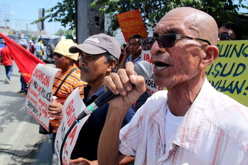 Transport group Transmision-Piston stages a protest action in front of the regional office of the Land Transportation Office Region XI condemning the new policy which requires all drivers to get clearance from the National Bureau of Investigation (NBI) and police. (Ace R. Morandante/davaotoday.com)