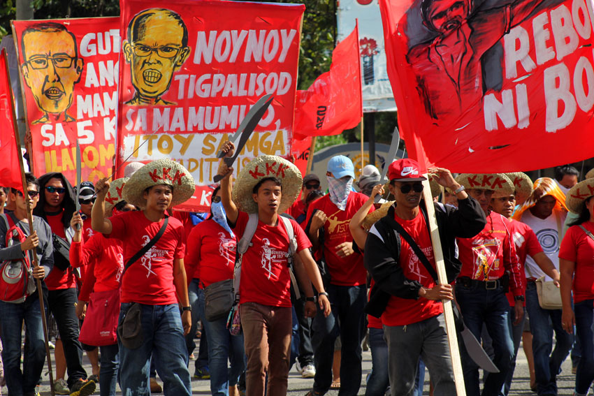 On the 152nd birthday of the founder of Katipunan, Andres Bonifacio, thousands of workers in Southern Mindanao Region march in Davao City to protest the neoliberal policies of globalization. (Ace R. Morandante/davaotoday.com)