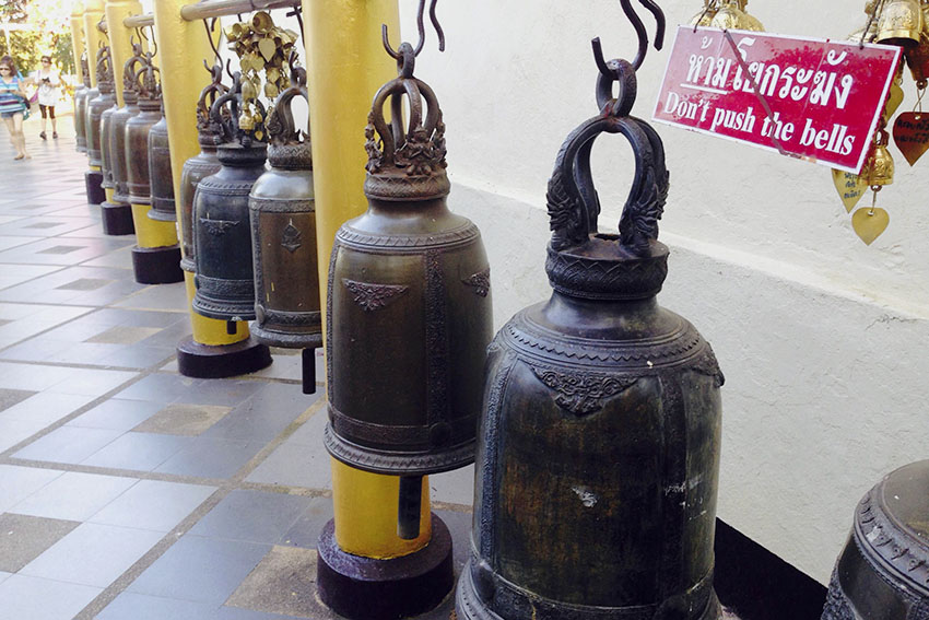 BELLS. These bells can be found just outside the temple in front of the view of Chiang Mai City. In traditional Buddhist belief, those who hear the bells ringing will have good luck and long life.