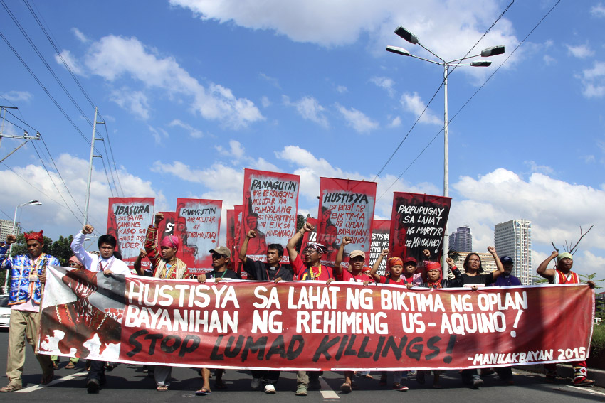 Lumads from Mindanao, together with support groups, march out of their camp in Liwasan Bonifacio to the Department of Justice in Manila calling for justice to the victims of the government's counter-insurgency program, Oplan Bayanihan. (Earl O. Condeza/davaotoday.com)