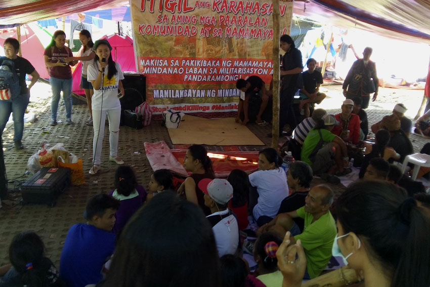 Kabataan Partylist's First Nominee, Sarah Elago, tells stories to the children and other delegates of Manilakbayan 2015 during the children's story reading session, earlier today. (Earl O. Condeza/davaotoday.com)