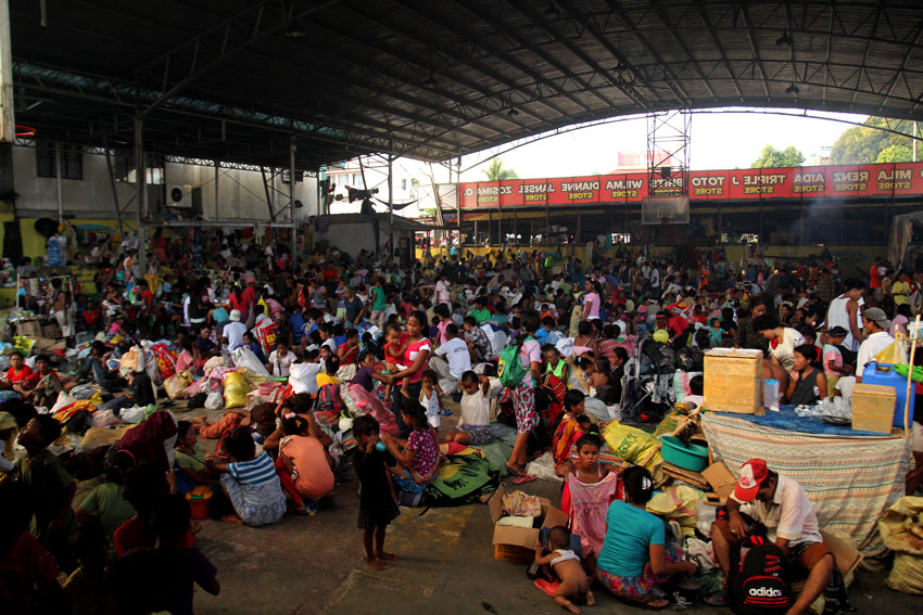 Thousands of Manobos from different barangays of Paquibato District stay in Buhangin gym after begging for Christmas gifts and carolling in the streets in Davao City. (Ace R. Morandante/davaotoday.com)