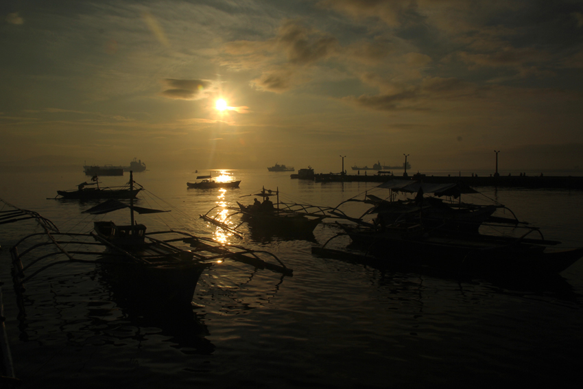 After sunrise, all fishing boats dock on this area of Sta Ana wharf in Davao City after the businessmen traders collect their tons of tamban fish (herring) catch. (Ace R. Morandante/davaotoday.com) 