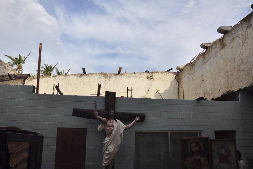 The roofing of a church in Barcelona, Sorsogon was blown away by strong winds caused by Typhoon Nona. (Photo Credit: Fr. Edgar Cleofe of the Diocese of Sorsogon) 