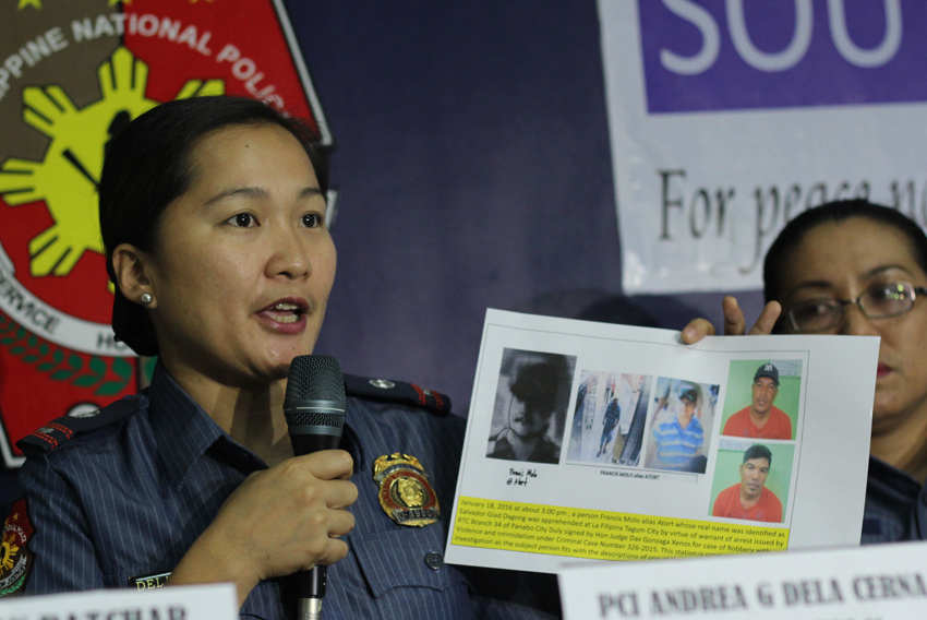 Chief Inspector Andrea Dela Cerna, spokesperson of Police Regional Office-XI, shows the photo of the alleged suspect of NCCC robbery identified as Salvador Giad Dagong, who is also known as Francis Molo or Atort, during the AFP/PNP press conference in Davao City on Wednesday morning. (Ace R. Morandante/davaotoday.com)