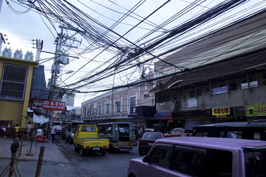 Cable wires along Ilustre Street curl up toward Duterte Street in Davao City. (Ace R. Morandante/davaotoday.com)