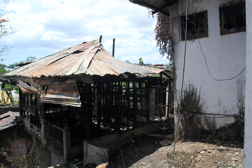  FO1 Rogel Jan Alucilja, investigator at the Bureau of Fire Protection says their initial investigation shows that the fire inside the UCCP compound was deliberately instigated. (Photo by Ace Morandante/davaotoday.com)