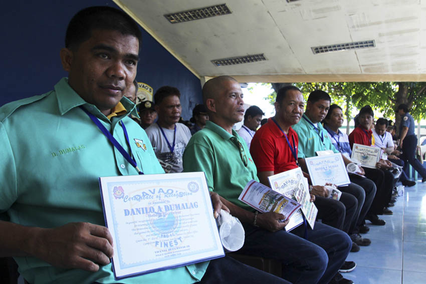 Taxi driver Danilo A. Dumalag receives a recognition from Davao City Police for demonstrating honesty to his passengers. Some 18 others were given citations at a ceremony at Camp Capt. Domingo E. Leonor on Monday, February 1. (Ace R. Morandante/davaotoday.com)