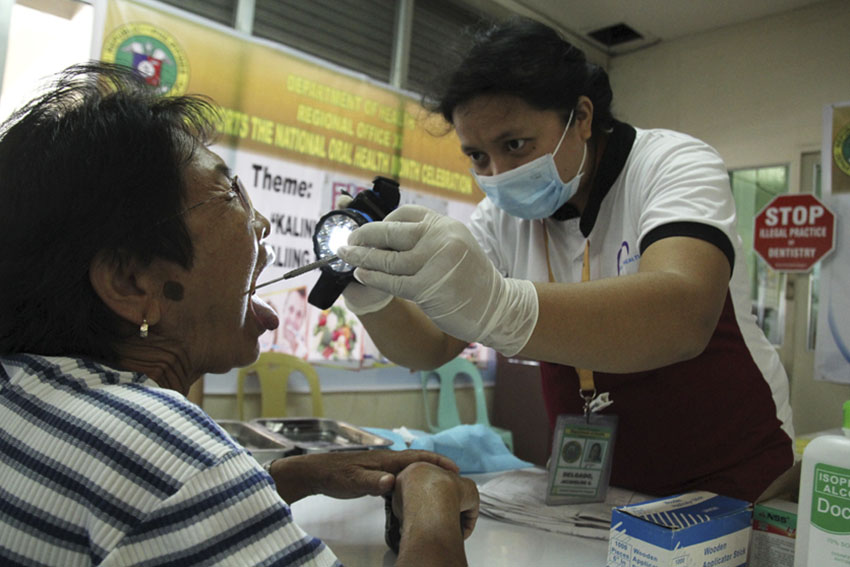 A woman receives a free dental checkup inside the City Council, Davao City, on Tuesday, February 9. Davao  residents here may avail of the public service until February 11. (Ace R. Morandante/davaotoday.com)