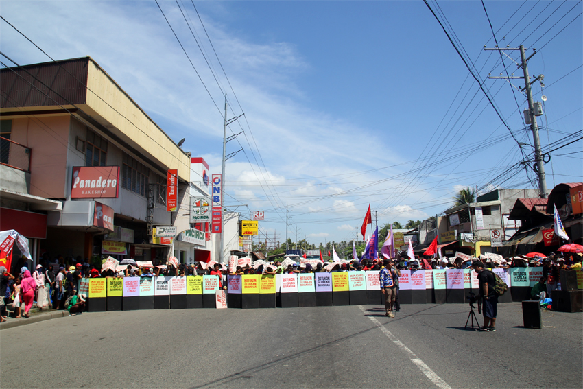 More or less 2,000 Lumad, farmers and small scale miners from different parts of Davao region set up a barricade in front of the Army's Eastern Mindanao Command headquarters in Panacan, Davao City to call for the pull out of military troops from the communities. The entrance and exit points in the north part of the city was totally closed for more than six hours on Friday, March 18.(Ace R. Morandante/davaotoday.com)