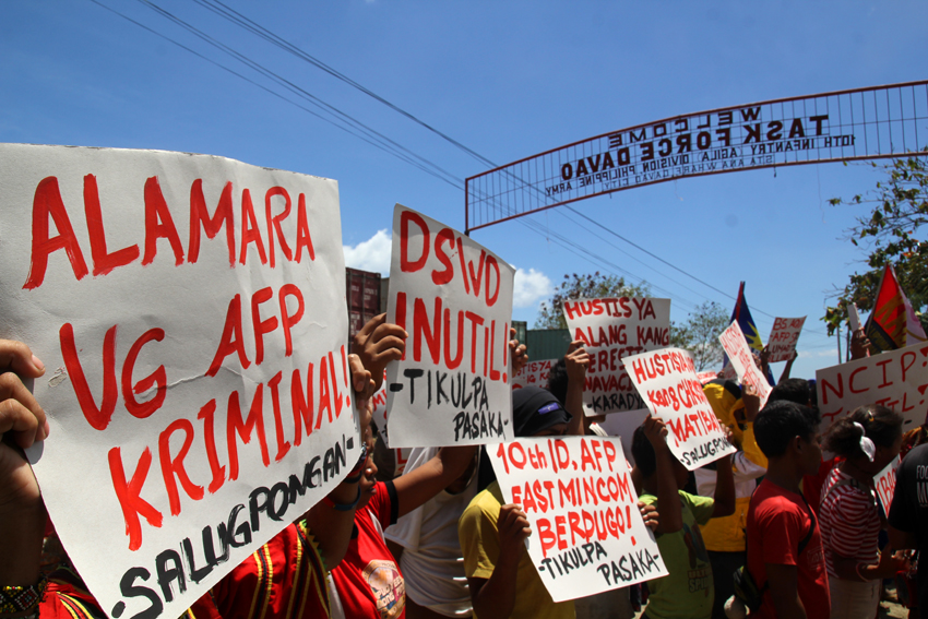 CONDEMNATION. Hundreds of Lumads and members of progressive organizations rally in front of Task Force Davao's headquarters to urge Commander Cristobal Zaragosa to apologize to the Lumad evacuees staying at the gutted Haran Compound  for his malicious statements. The protesters also called Zaragosa as "torturer" of the health workers in Morong, Rizal who were wrongly arrested based on trumped up charges that they were New People's Army members. Ace R. Morandante/davaotoday.com)