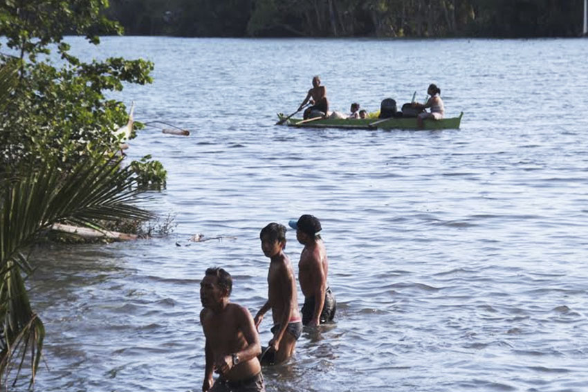 Unknown to these swimmers in the Davao River, the Environmental Management Bureau of the Department of Environment of Natural Resources 11 has released a study which reveals the highest fecal coliform reading in a sampling station in Davao River has 16-million MPN (most probable number) per 100 liters. The data was presented in a press conference on Friday, March 11. (Medel V. Hernani/davaotoday.com)