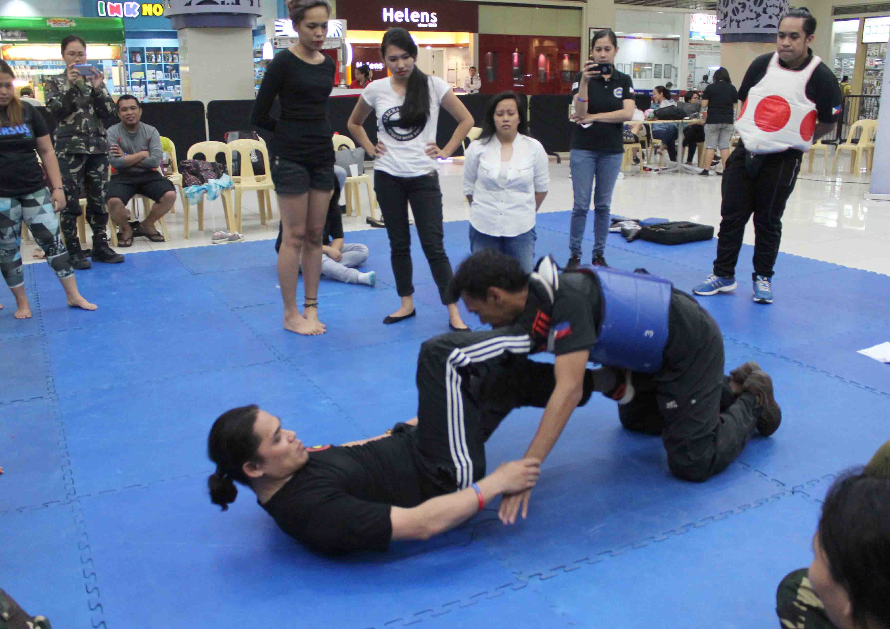 SELF DEFENSE TRAINING. Members of Bagani Martial Arts Center in Davao City show the foot work defense which can be used by women against their attackers.(Medel V. Hernani/davaotoday.com)